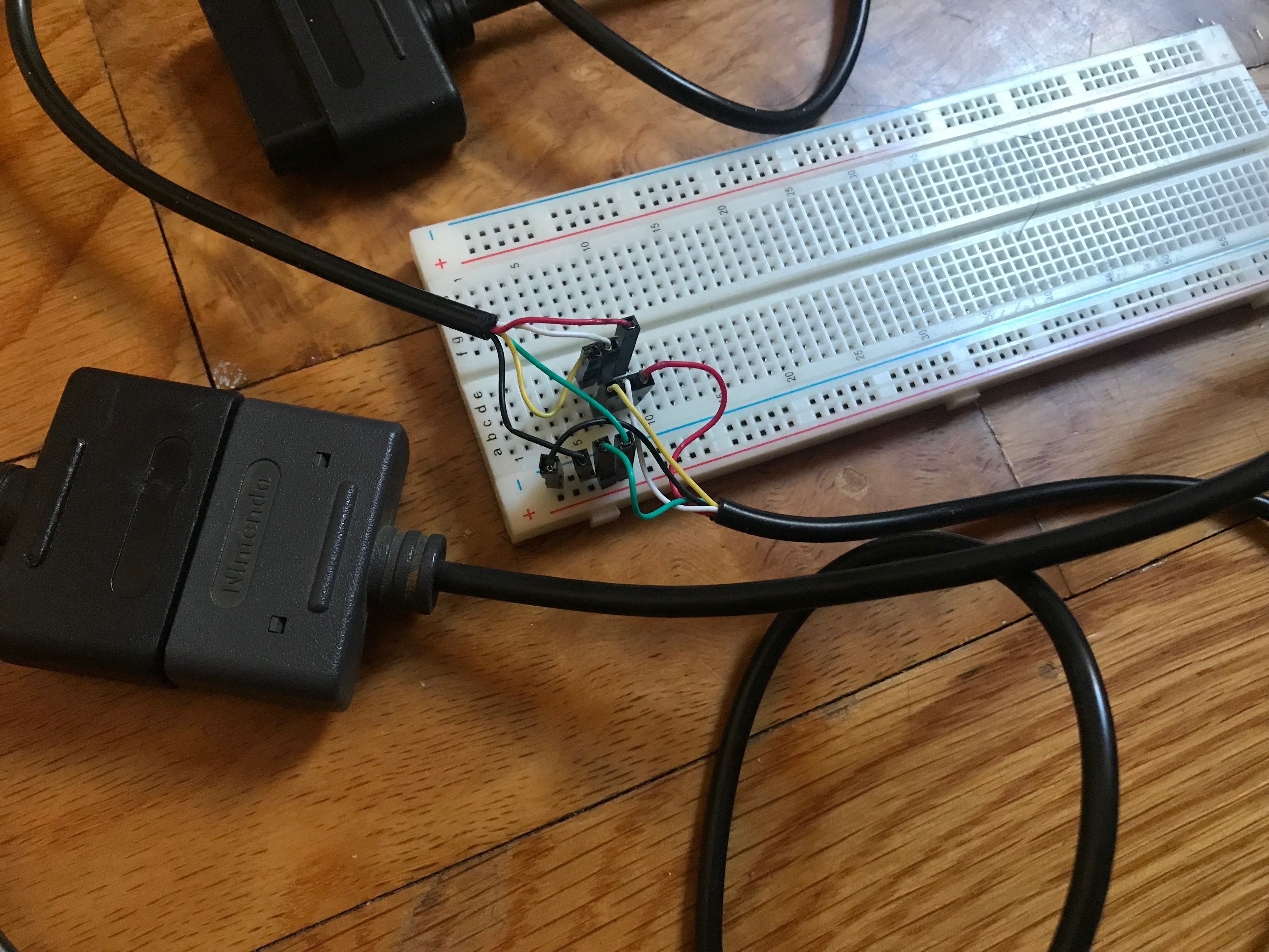 Extension cable spliced and plugged into breadboard